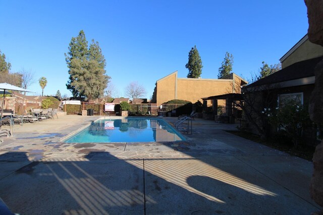 view of pool with a patio