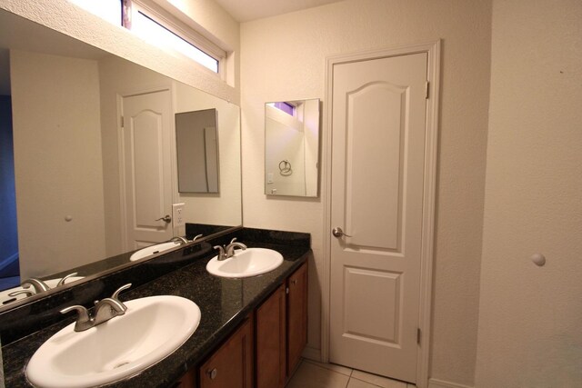 bathroom featuring vanity and tile patterned floors