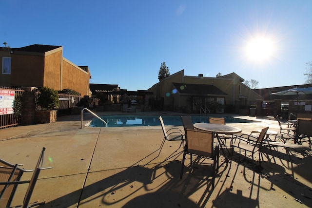 view of pool featuring a patio area