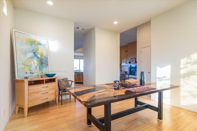 dining space with light wood-type flooring