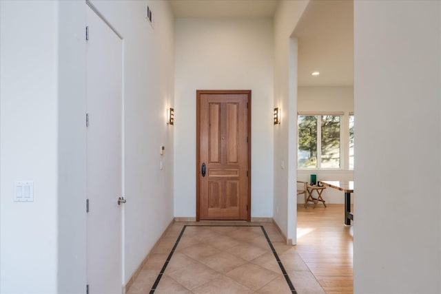 interior space with light tile patterned floors