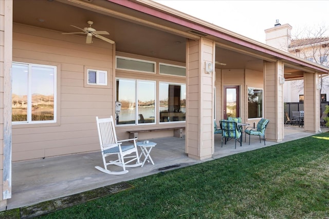 view of patio / terrace featuring ceiling fan