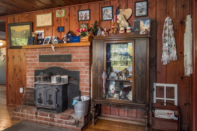 room details with wood ceiling, wooden walls, and wood-type flooring