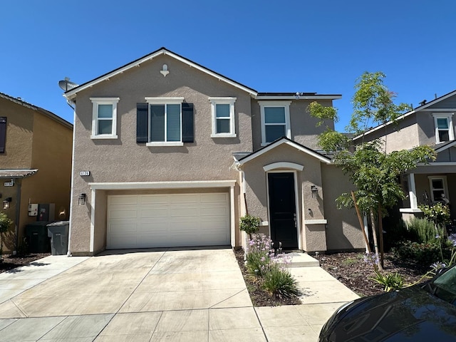 view of front of property with a garage