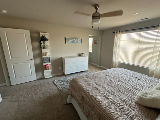 carpeted bedroom with ceiling fan