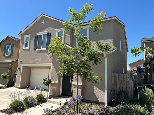 view of front of home with a garage