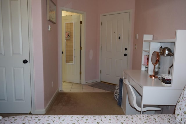 interior space with light tile patterned floors