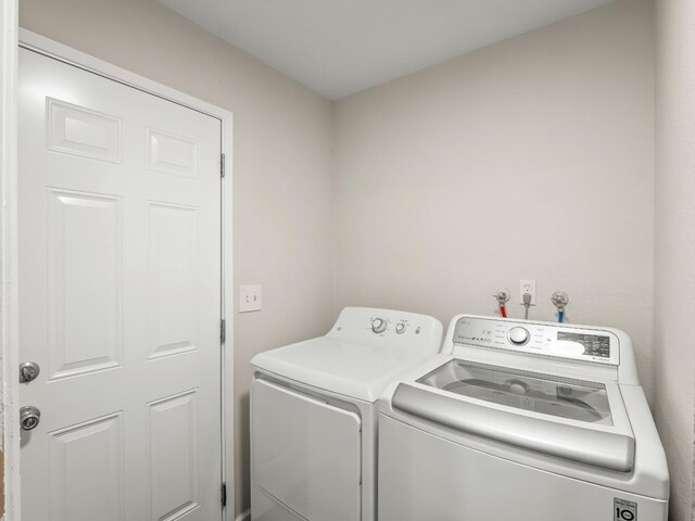 laundry area with laundry area and washer and dryer