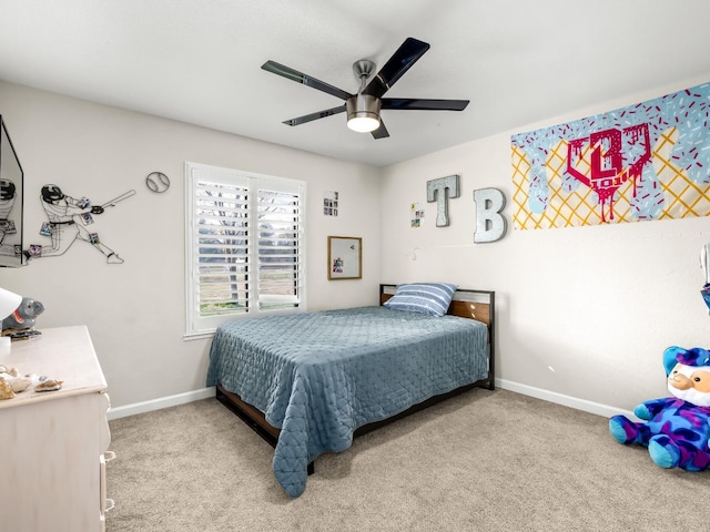 bedroom featuring a ceiling fan, baseboards, and carpet flooring