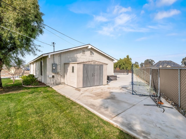 view of outbuilding with fence