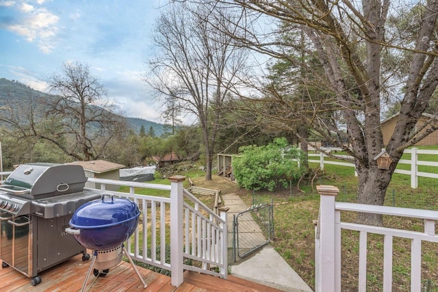 deck featuring grilling area and a mountain view