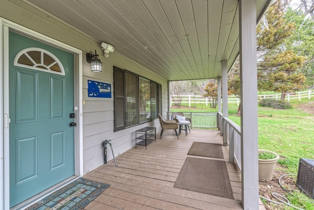 wooden terrace with covered porch