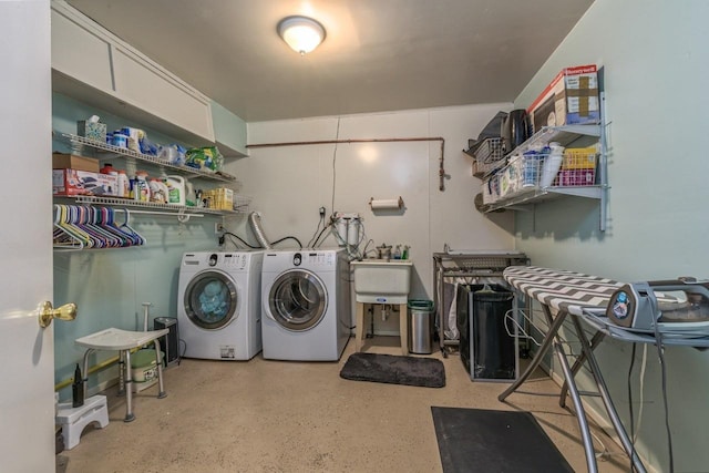 laundry area featuring washing machine and dryer