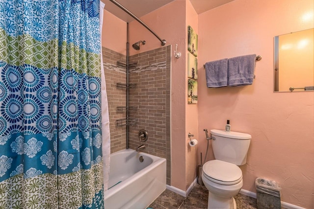 bathroom featuring tile patterned flooring, shower / tub combo with curtain, and toilet