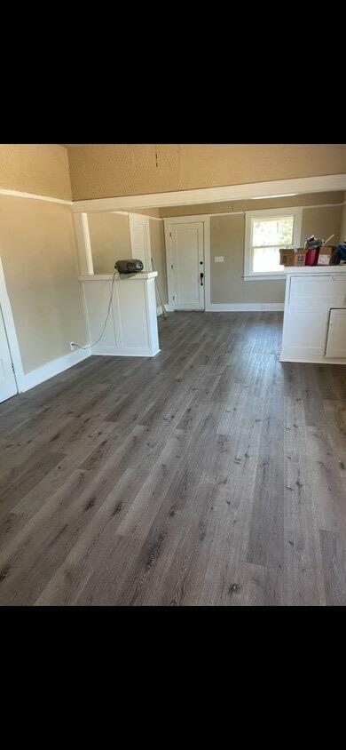 interior space with dark hardwood / wood-style flooring