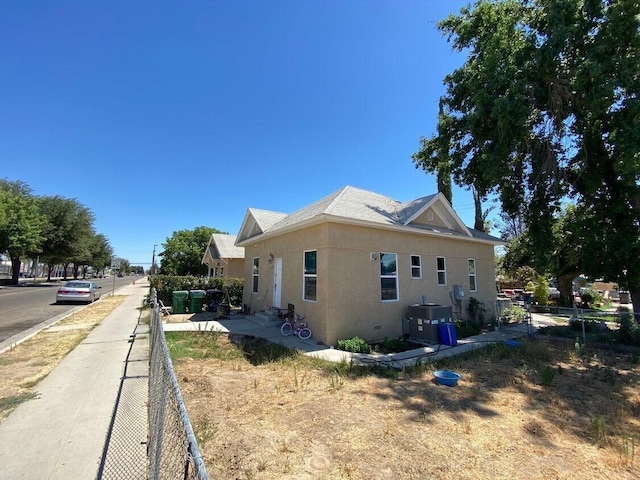 view of property exterior featuring central AC unit