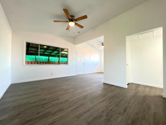 interior space featuring vaulted ceiling and dark hardwood / wood-style floors