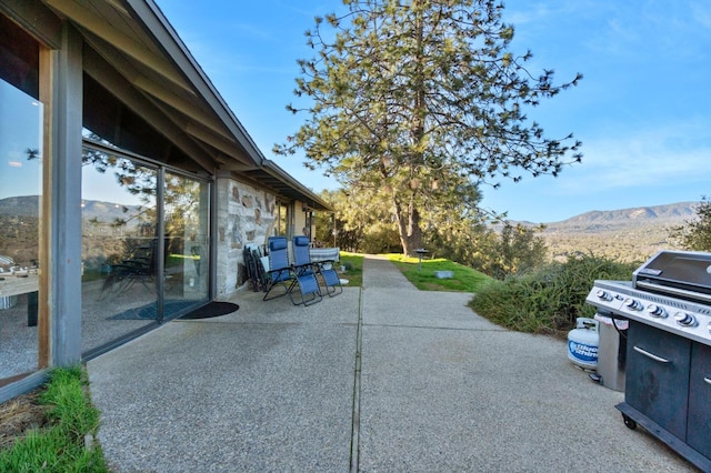 view of patio with a mountain view