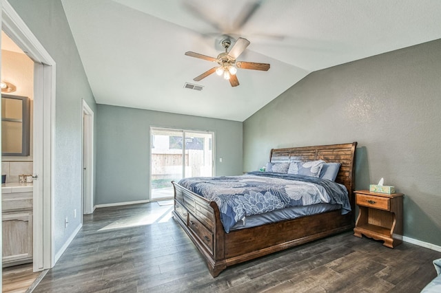 bedroom with dark wood-style flooring, visible vents, baseboards, vaulted ceiling, and access to exterior