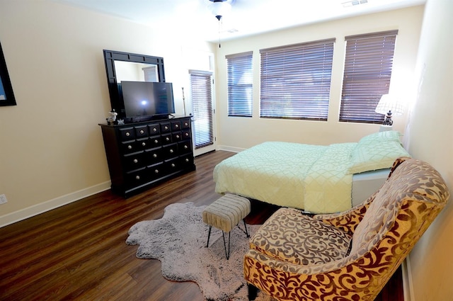 bedroom featuring dark wood-type flooring