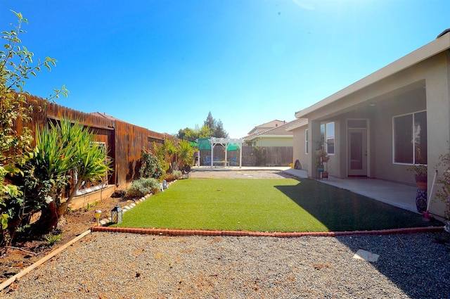 view of yard featuring a patio