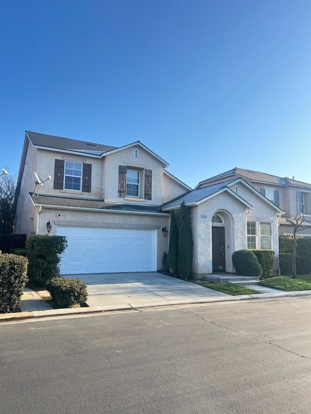 view of front property with a garage