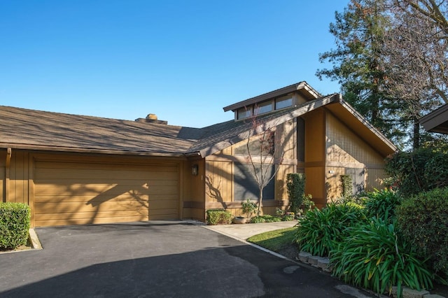 view of front of house with a garage