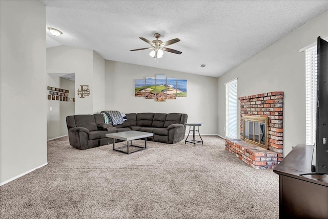 living room featuring a textured ceiling, vaulted ceiling, and carpet flooring