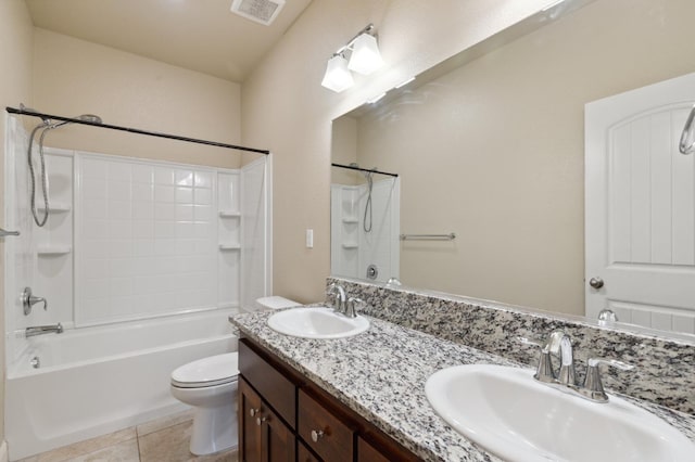 full bathroom featuring toilet, tile patterned floors, shower / washtub combination, and vanity