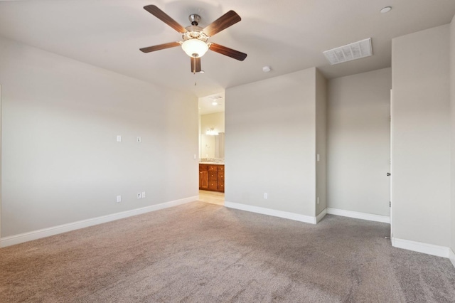 carpeted empty room with ceiling fan