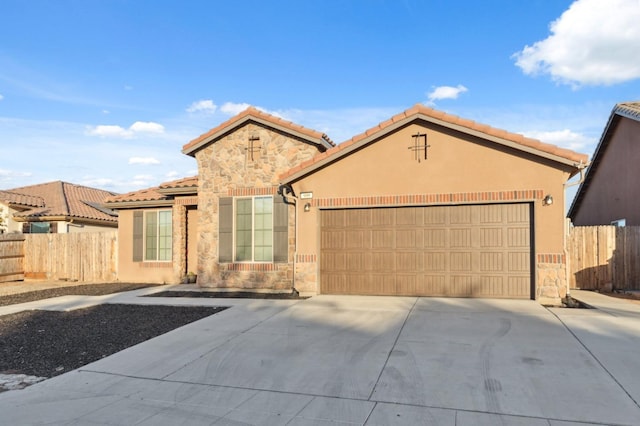 view of front of home with a garage