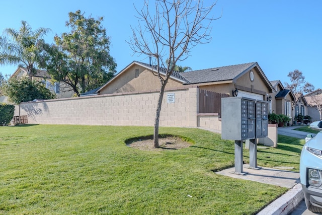 view of yard with mail boxes