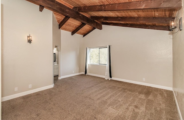 empty room featuring baseboards, wood ceiling, carpet flooring, high vaulted ceiling, and beam ceiling