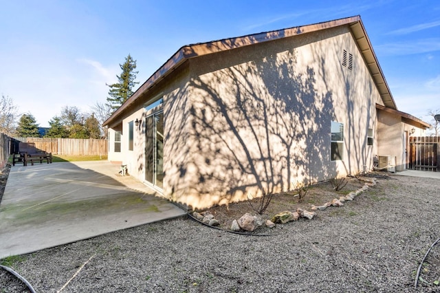 view of home's exterior with a patio area