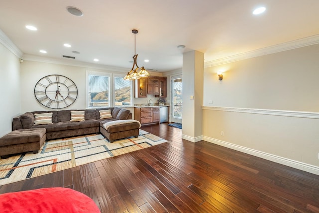 living room featuring dark wood-type flooring and crown molding