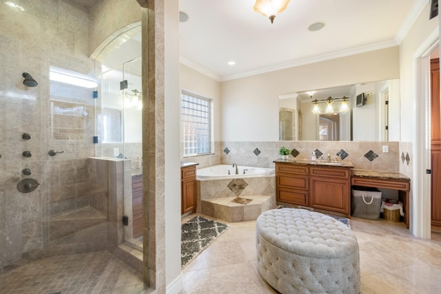 bathroom with tile patterned floors, vanity, tasteful backsplash, ornamental molding, and independent shower and bath