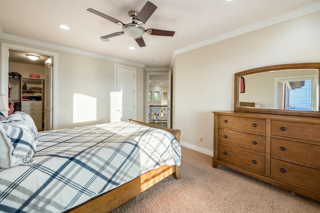 bedroom with light carpet, ceiling fan, ornamental molding, and a closet