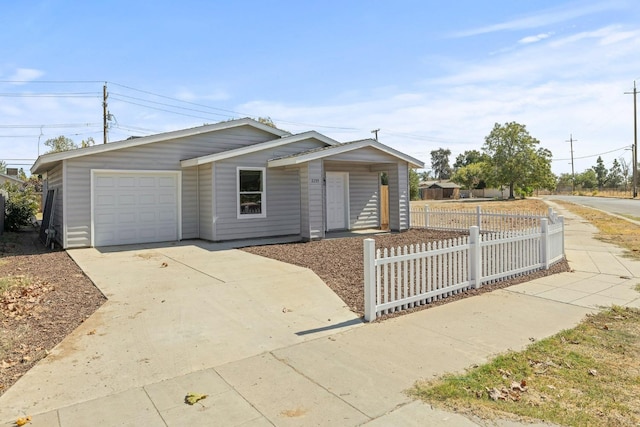 ranch-style home with a garage