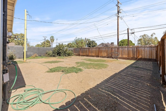 view of yard featuring a fenced backyard