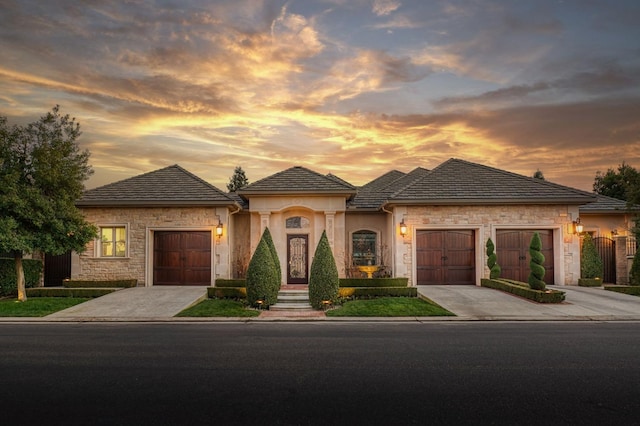 view of front of property with a garage