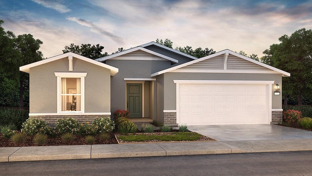 view of front of property with a garage