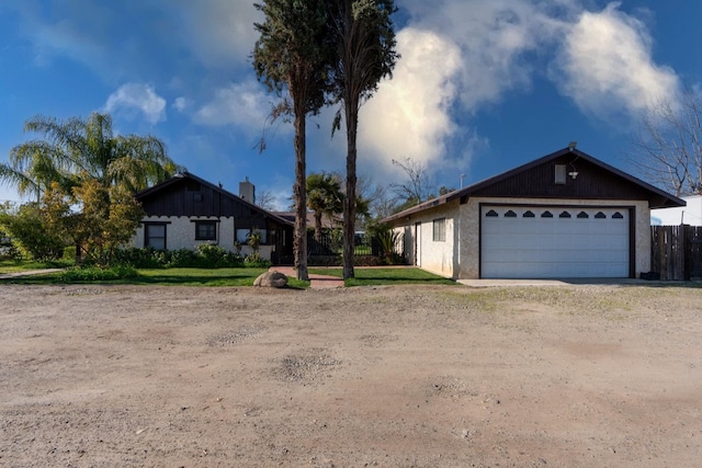 single story home featuring a garage