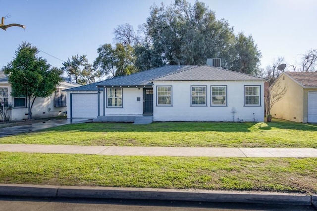 single story home featuring a garage, a front yard, and cooling unit