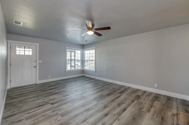 foyer featuring ceiling fan and hardwood / wood-style floors