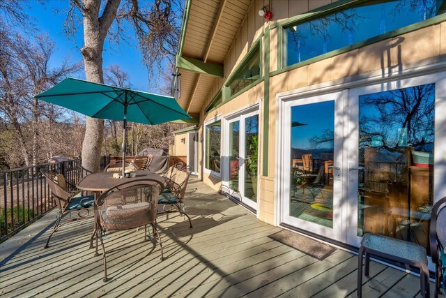 wooden deck with french doors