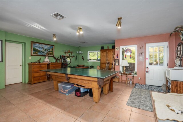 game room with light tile patterned floors