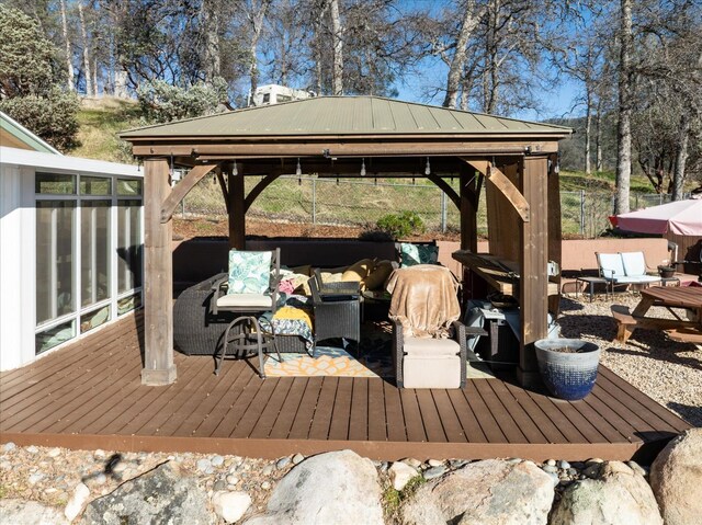 wooden deck with a gazebo