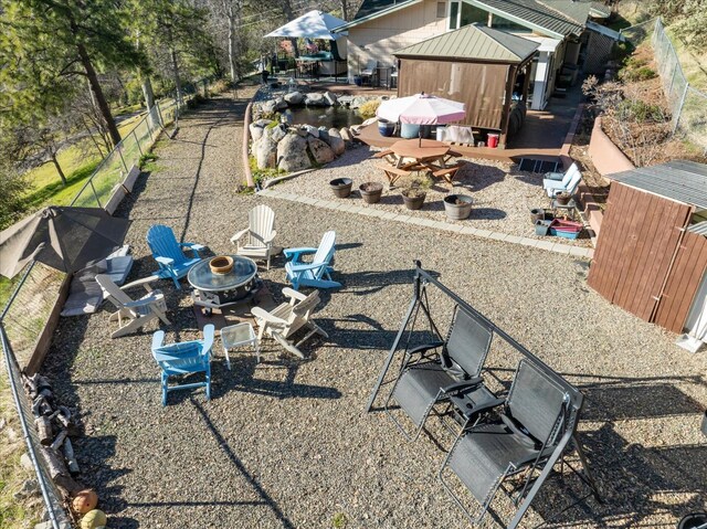 view of yard with a gazebo and an outdoor fire pit