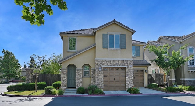 mediterranean / spanish-style home featuring a garage