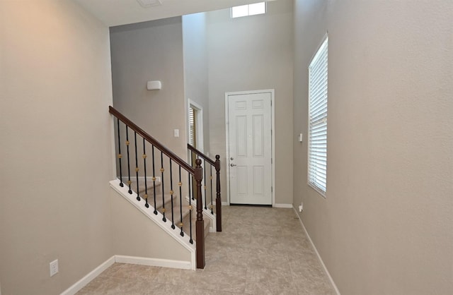 entryway with a high ceiling